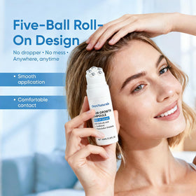 ORRÉNATURALS applying roll-on to scalp for targeted nourishment