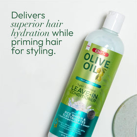 ORS being worked through damp hair for easier detangling