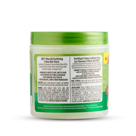 ORS cream texture close-up highlighting rich olive-infused formula for deep conditioning