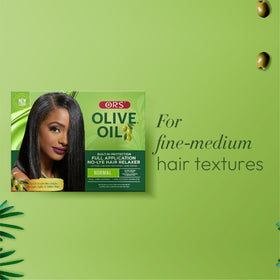 ORS relaxer being applied in salon illustrating professional use and controlled application