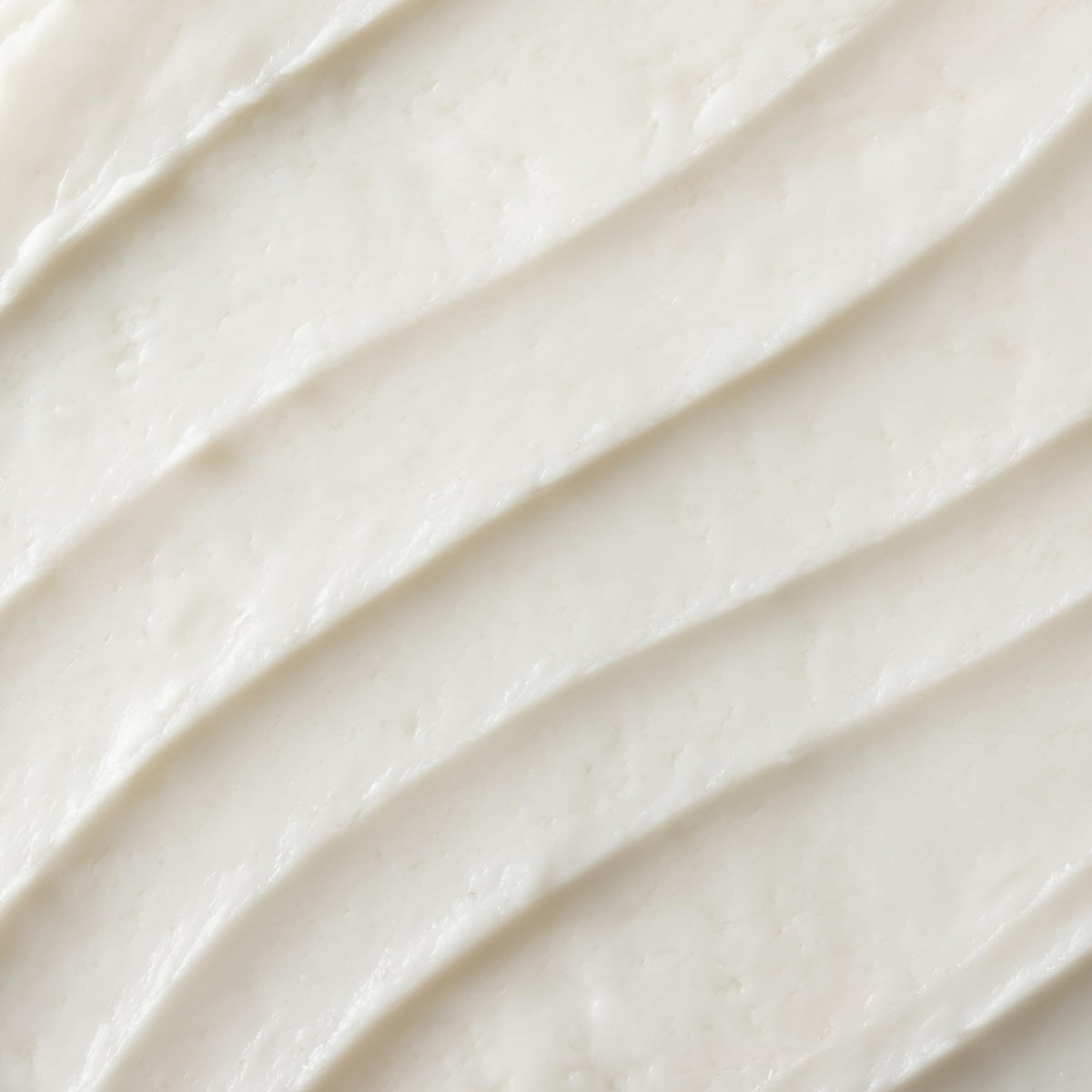 OSEA product applied on hand demonstrating lightweight spreadability and absorbency