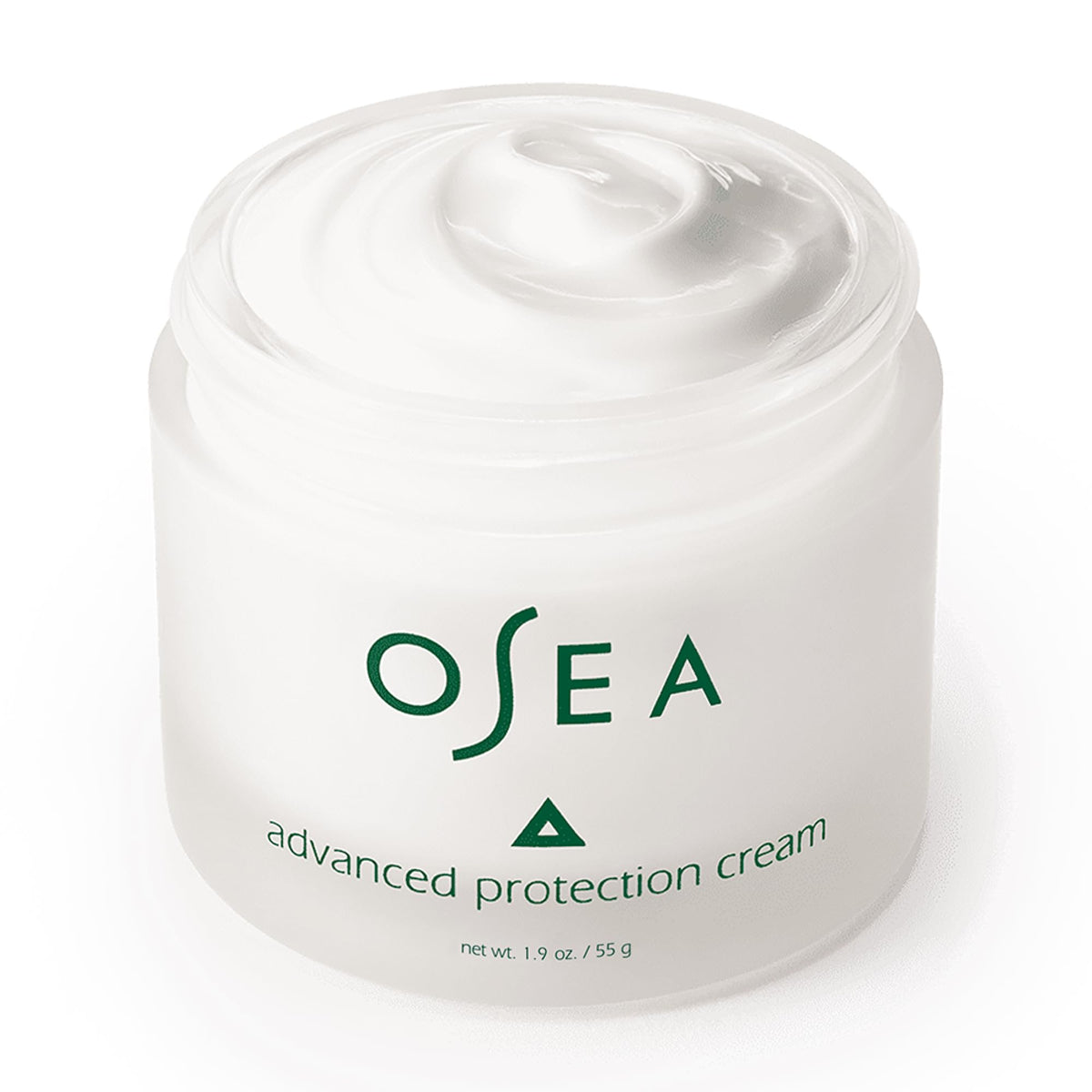OSEA 1oz jar next to a coin for scale, communicates travel-friendly size