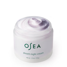 OSEA lavender sprig beside jar conveying calming scent benefit