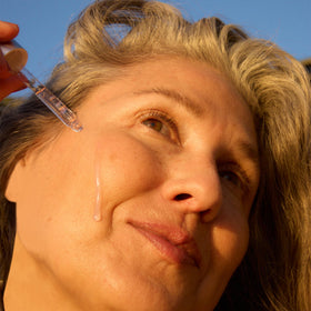 OSEA pipette dispensing serum texture demonstrating smooth, hydrating application