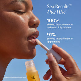 OSEA lip oil on model's lips illustrating instant shine and plumping
