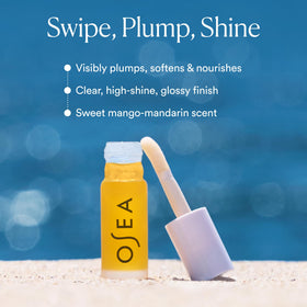 OSEA clear lip oil swatched to show glossy texture and hydrating effect