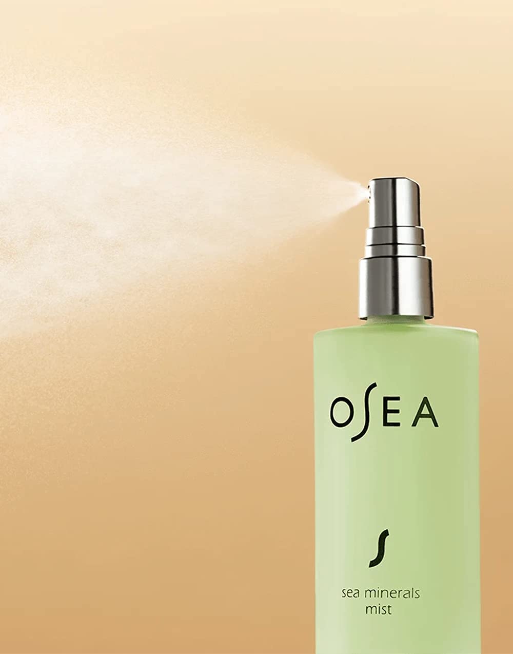 OSEA close-up of toner droplets and texture on skin illustrating lightweight absorption and dewy finish