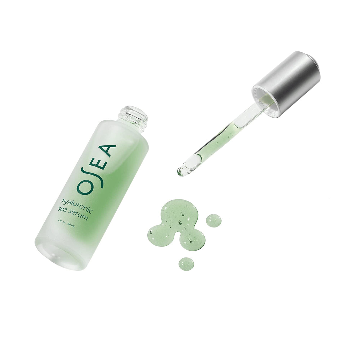 OSEA serum smoothed on skin demonstrating dewy finish and instant moisturization