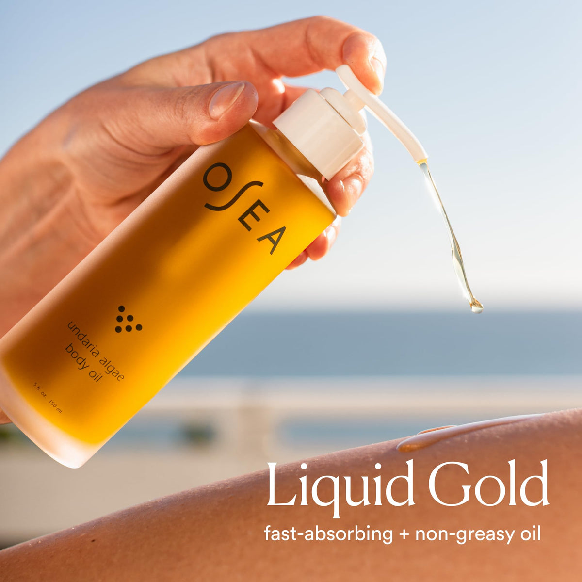 OSEA pouring a drop to show smooth pourability and spreadability