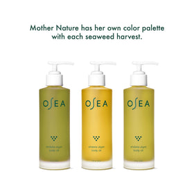 OSEA bottle beside hand to show scale and travel-friendly size