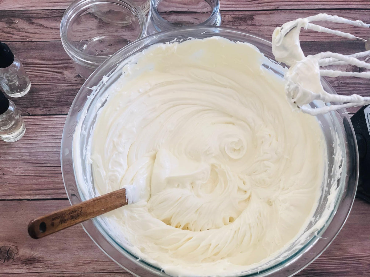 Oslove Organics butter melting on hand illustrating easy absorption benefit