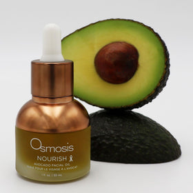 OSMOSIS bottle next to coin showing 1 fl oz size and travel-friendly compactness