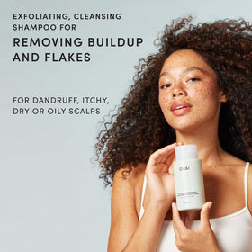 OUAI label close-up highlighting directions and active ingredient reassurance