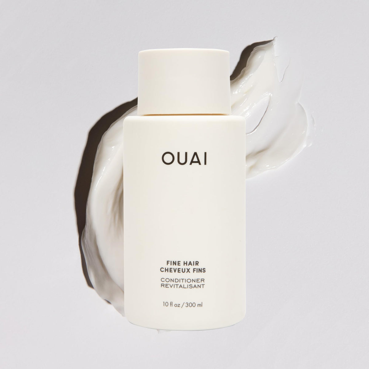 OUAI label close-up highlighting ingredients and clear product identity