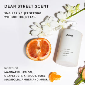 OUAI bottle beside hand shows real-size scale and one-handed use benefit