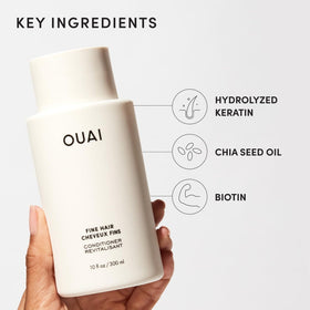Texture of OUAI conditioner on hand showing lightweight, non-greasy formula for lift