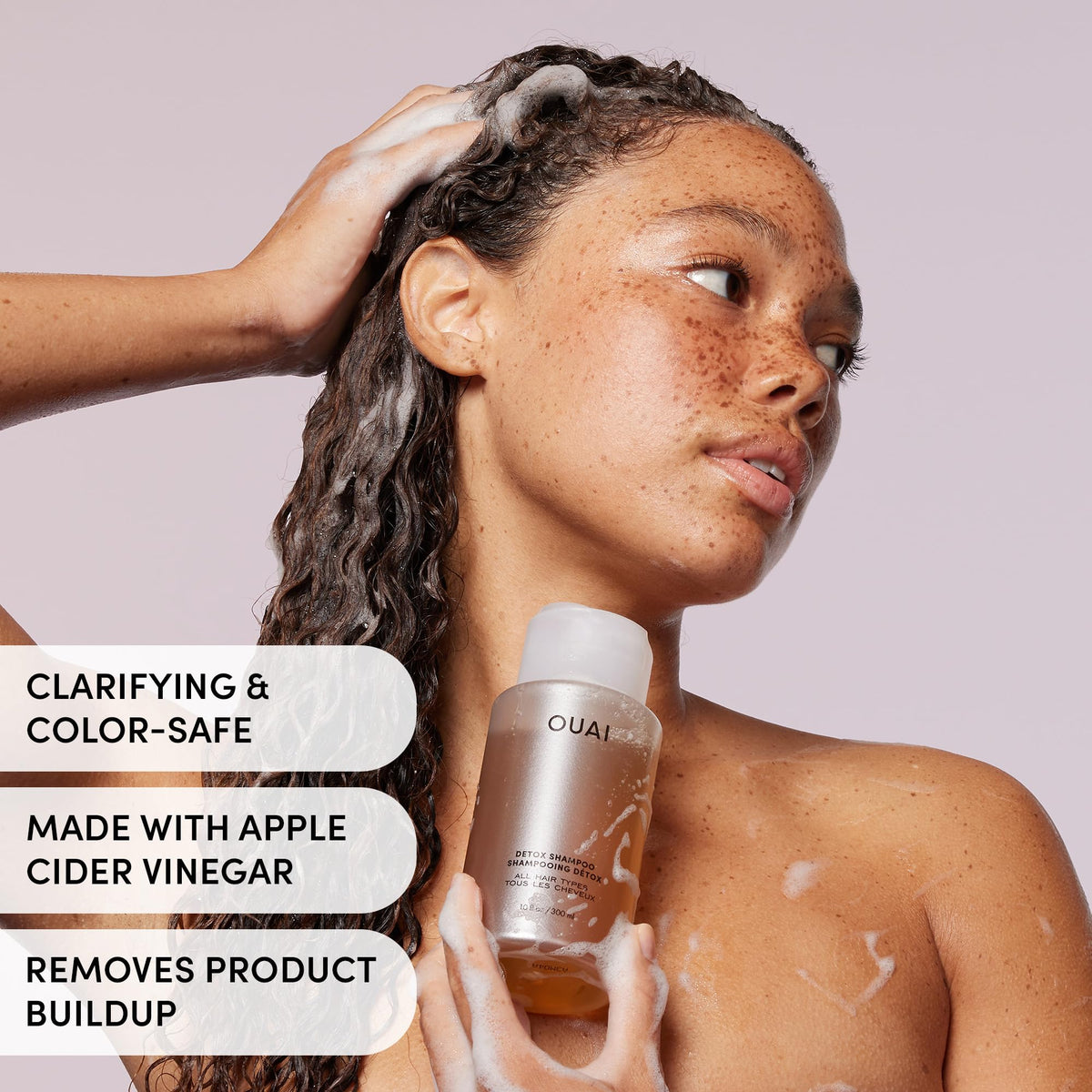 OUAI detox shampoo close-up formula with apple cider vinegar droplets for gentle exfoliation