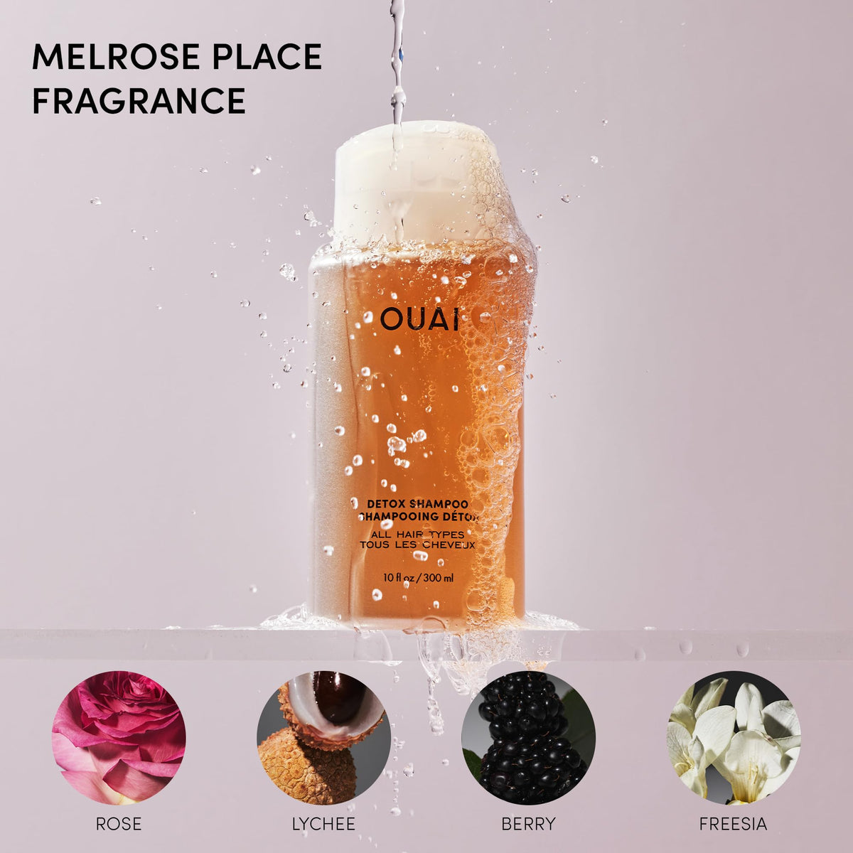 OUAI detox shampoo bottle inside shower illustrating rinsable, sulfate-free formula
