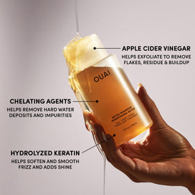 OUAI detox shampoo on bathroom shelf lifestyle scene suggesting effortless self-care