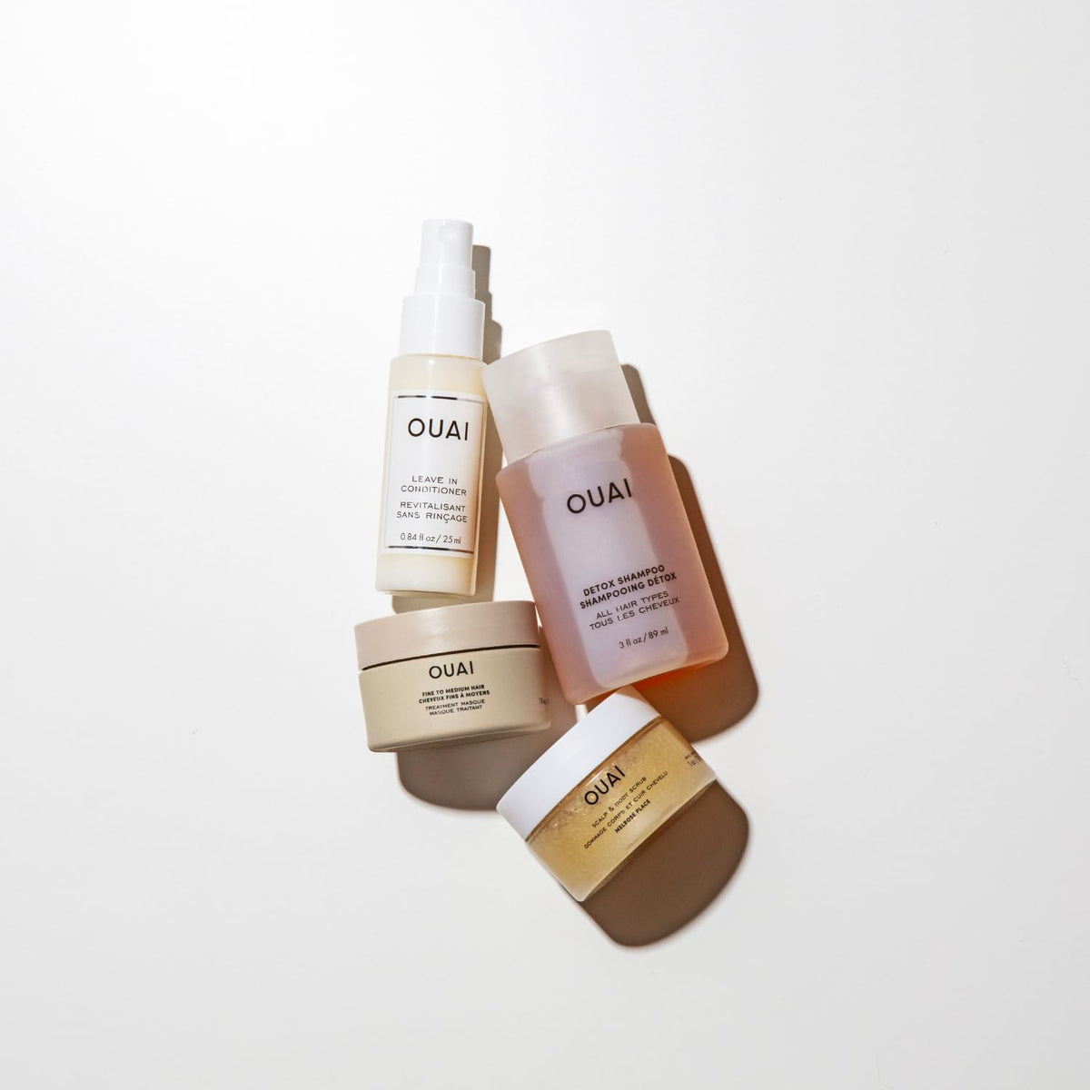 OUAI Apple Cider Detox Shampoo pouring texture showing clarifying benefit