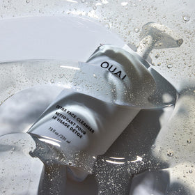 OUAI detox next to ruler shows the 7.8 fl oz size and travel readiness