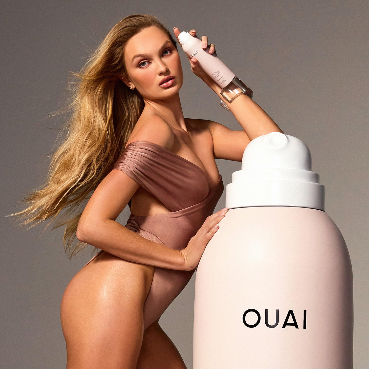 OUAI inside travel bag with styling tools for on-the-go freshness