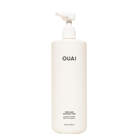 OUAI front bottle view showing 32 oz label and salon-size benefit
