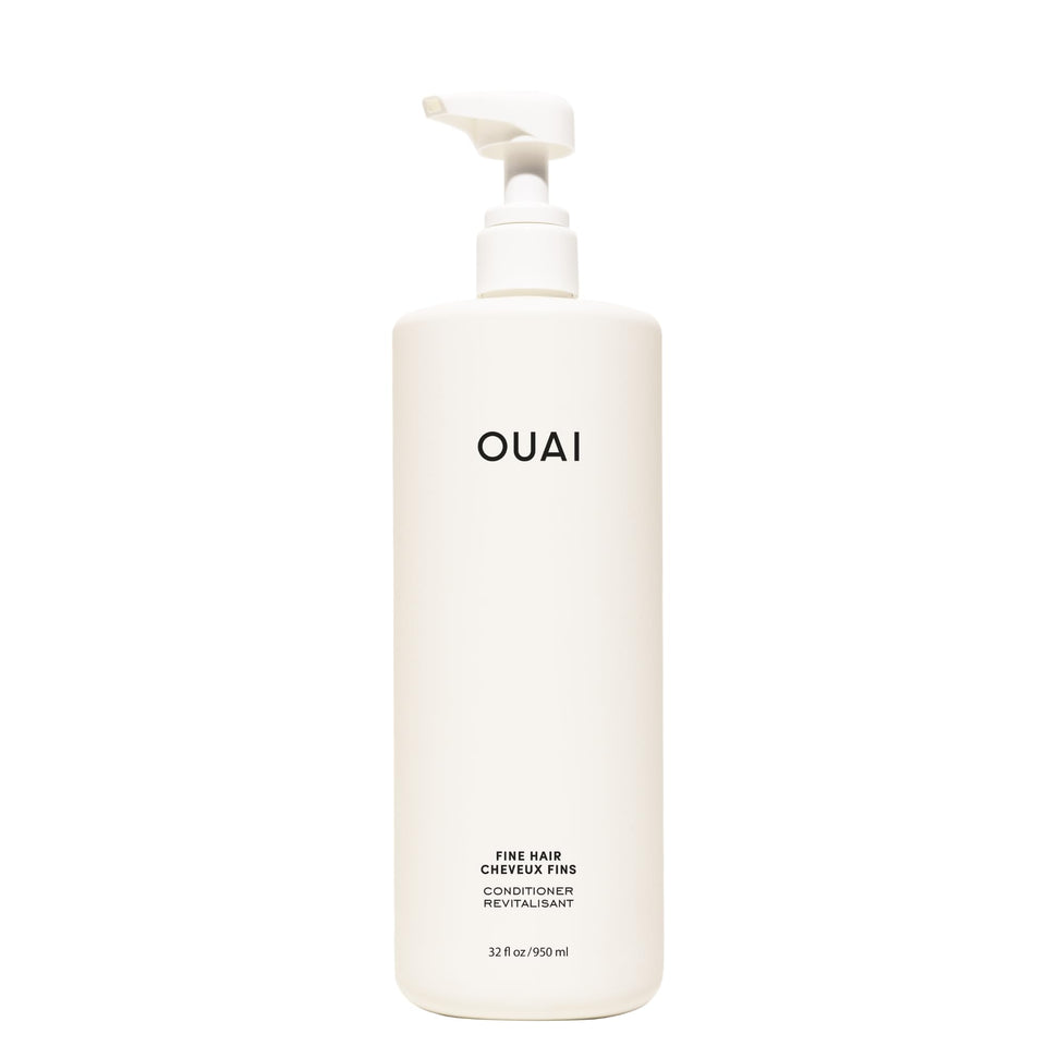 OUAI front bottle view showing 32 oz label and salon-size benefit