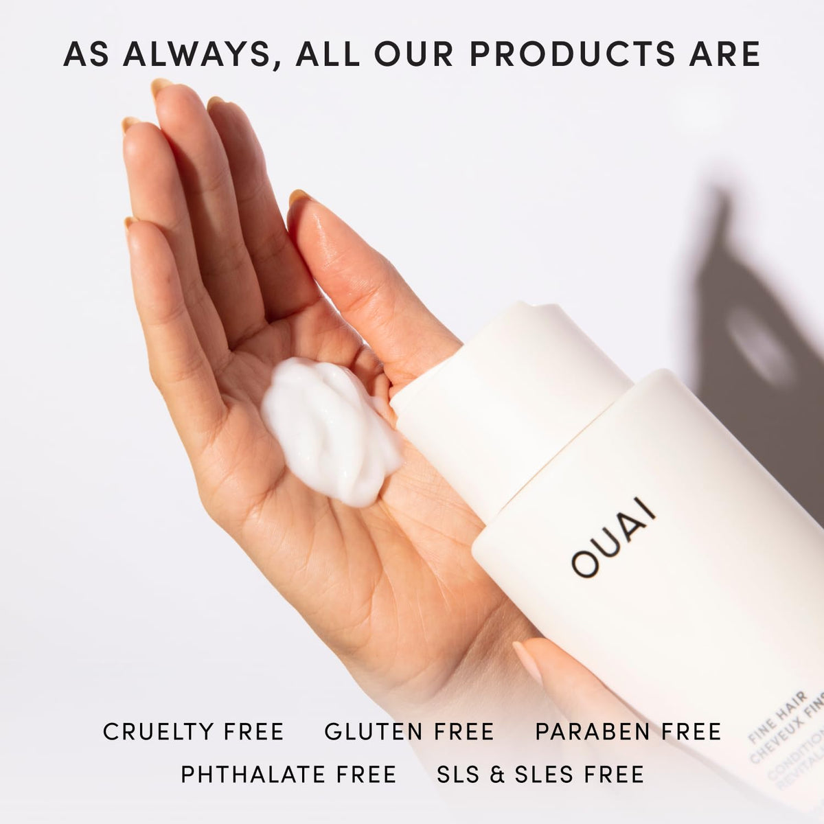 OUAI applying conditioner to mid-lengths showing targeted placement