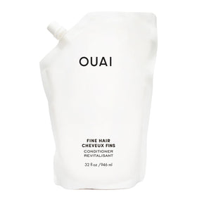 OUAI refill pouch front view showing packaging and size benefit: eco-friendly refill