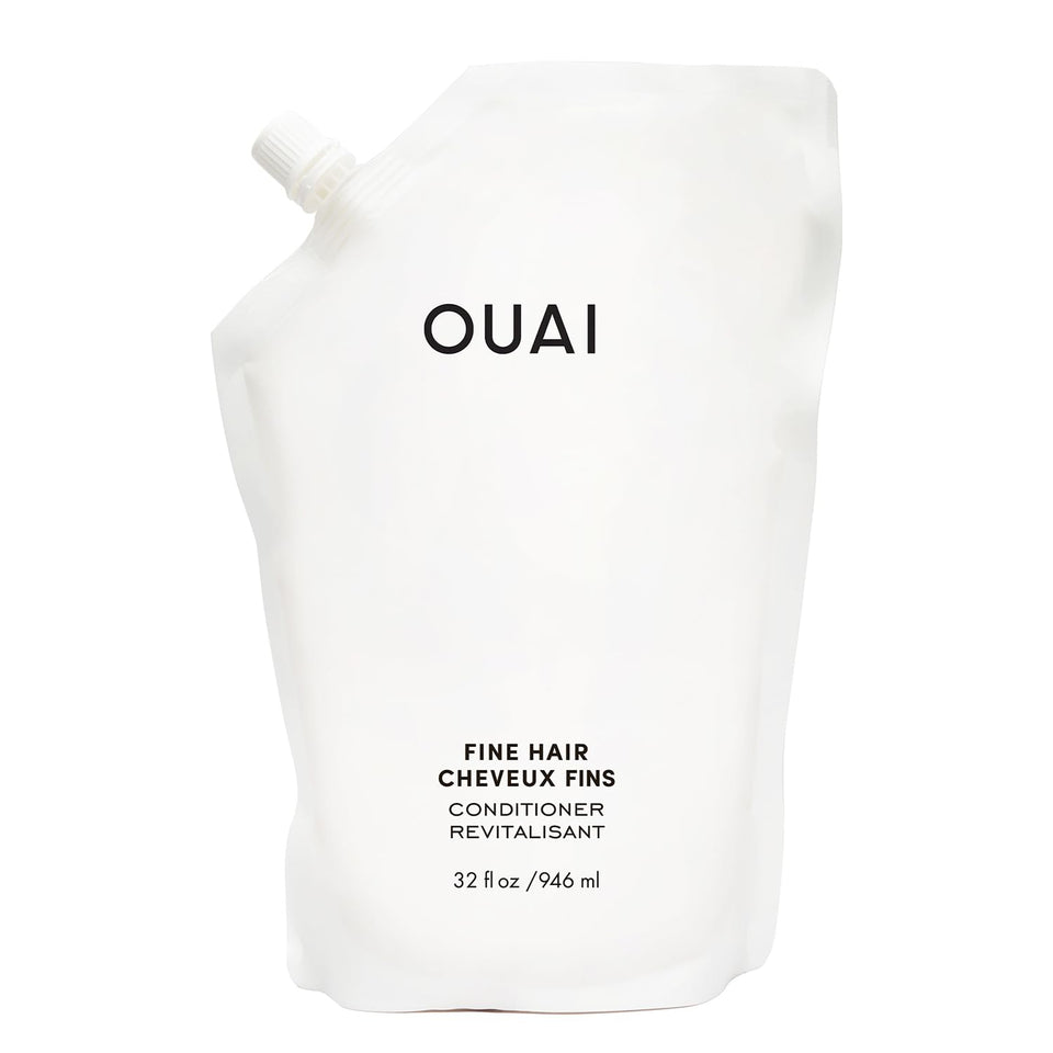 OUAI refill pouch front view showing packaging and size benefit: eco-friendly refill