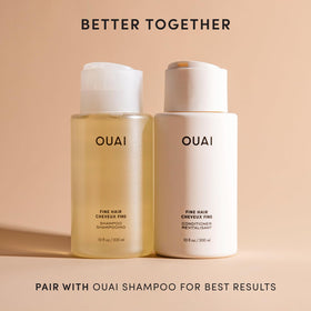 OUAI bottle in hand for scale demonstrating large 32 oz value