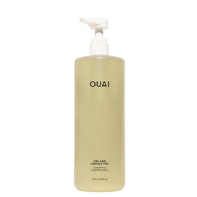 OUAI front bottle view showing 32 oz volume and clean design benefit