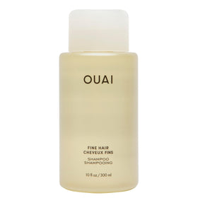 OUAI bottle front view showing product label and volume benefits