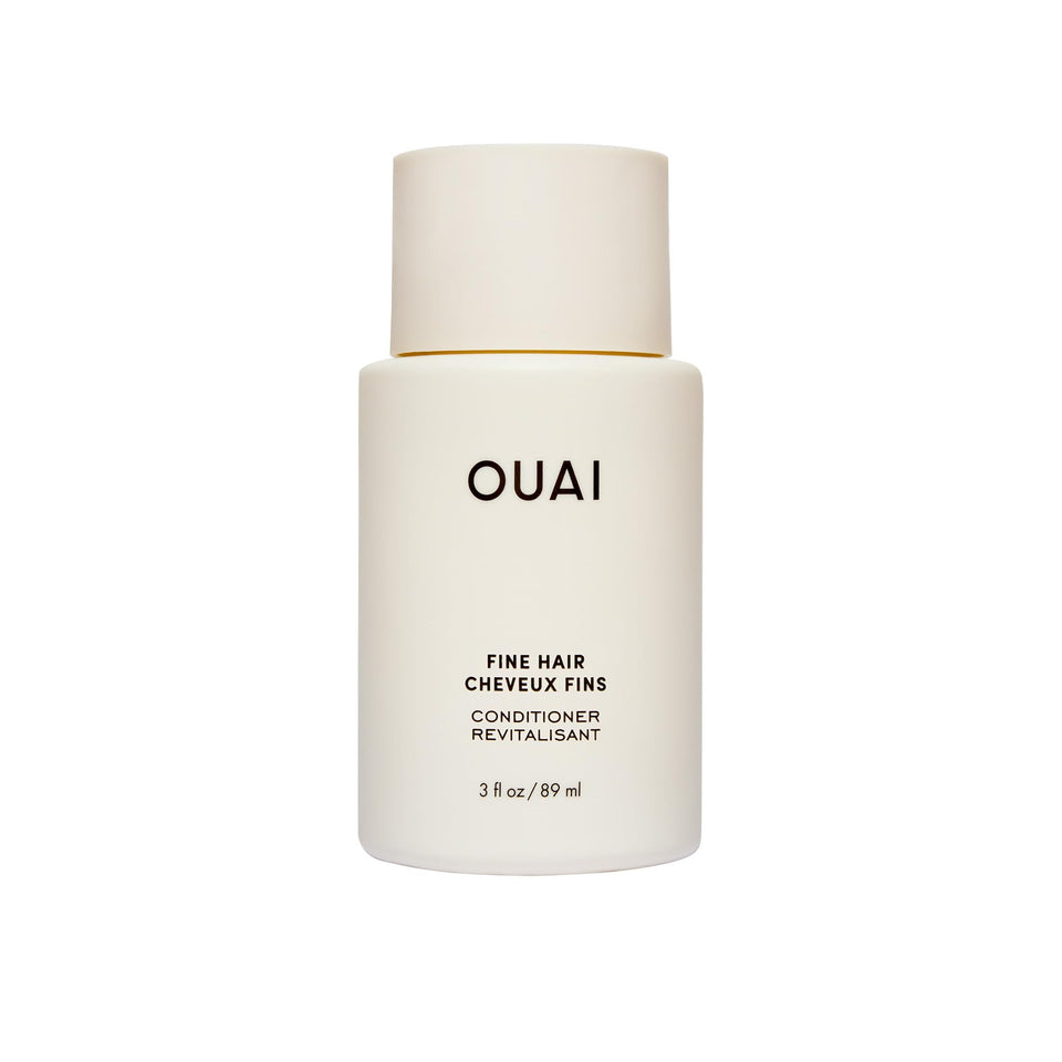 OUAI front packaging showing travel-size conditioner and portability benefit