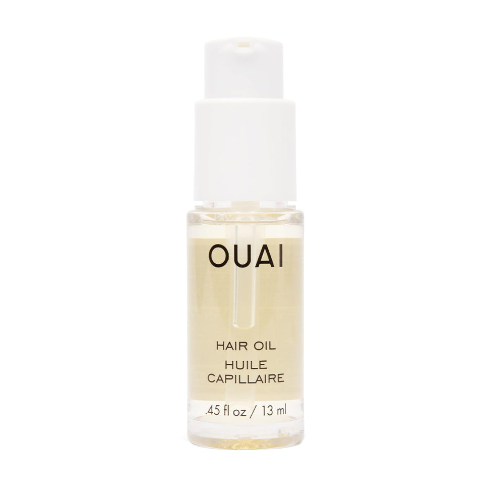 OUAI travel bottle front packaging showing compact size and brand benefit