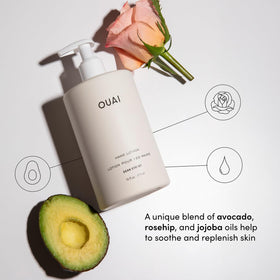 OUAI hand lotion pump dispensing into hand demonstrating quick application benefit