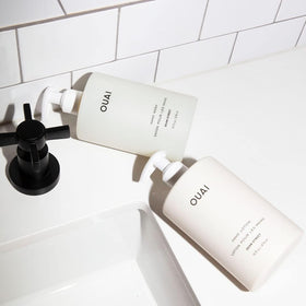 OUAI handcare in use washing hands to illustrate cleansing performance and comfort