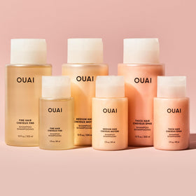 OUAI bottle styled on bathroom shelf conveying everyday luxury and routine