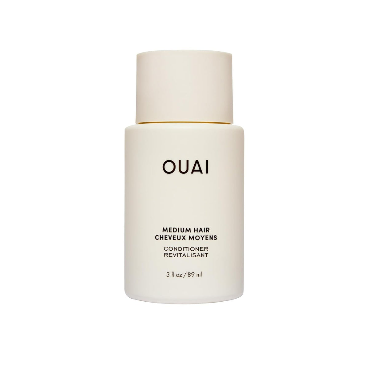 OUAI medium conditioner front packaging showing bottle and logo for brand recognition and travel convenience