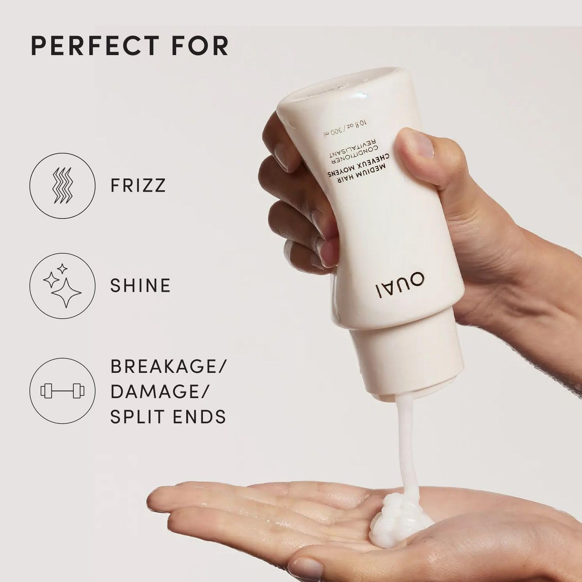 OUAI medium conditioner inside a compact travel kit showing portability and grooming readiness