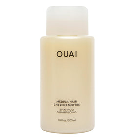 OUAI medium shampoo front packaging showing clean bottle and branding, conveys gentle cleansing