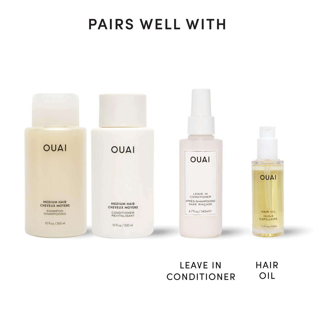 OUAI bottles in hand to show 10 fl oz size and travel-friendly benefit