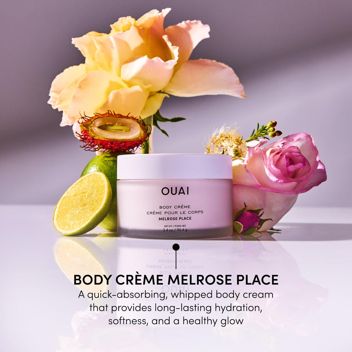 OUAI applying cream on arm to show softening and non-greasy finish benefit