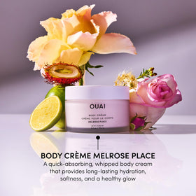 OUAI applying cream on arm to show softening and non-greasy finish benefit