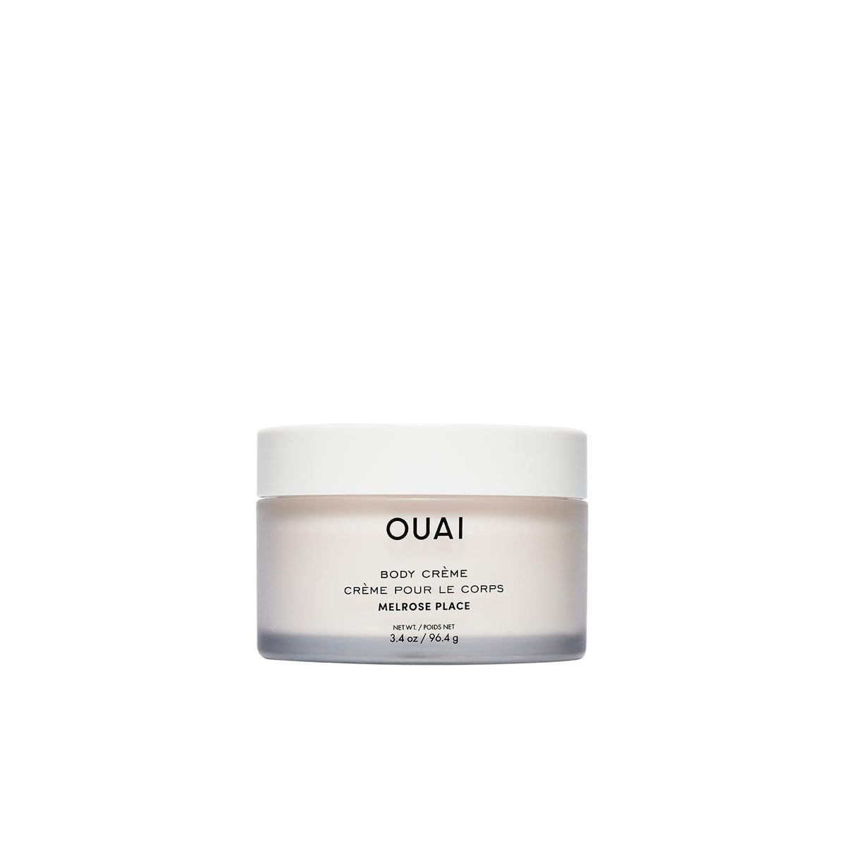 OUAI jar front view showing Melrose Place travel cream and packaging benefit