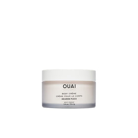 OUAI jar front view showing Melrose Place travel cream and packaging benefit