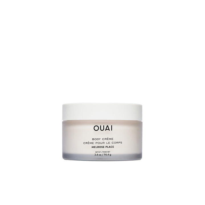 OUAI jar front view showing Melrose Place travel cream and packaging benefit
