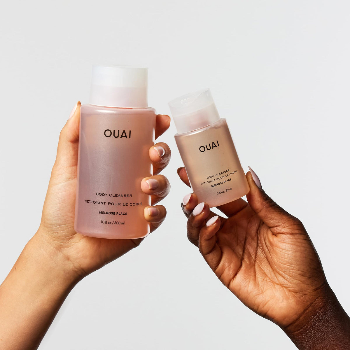 OUAI Melrose Place texture on hand showing creamy foaming cleanser