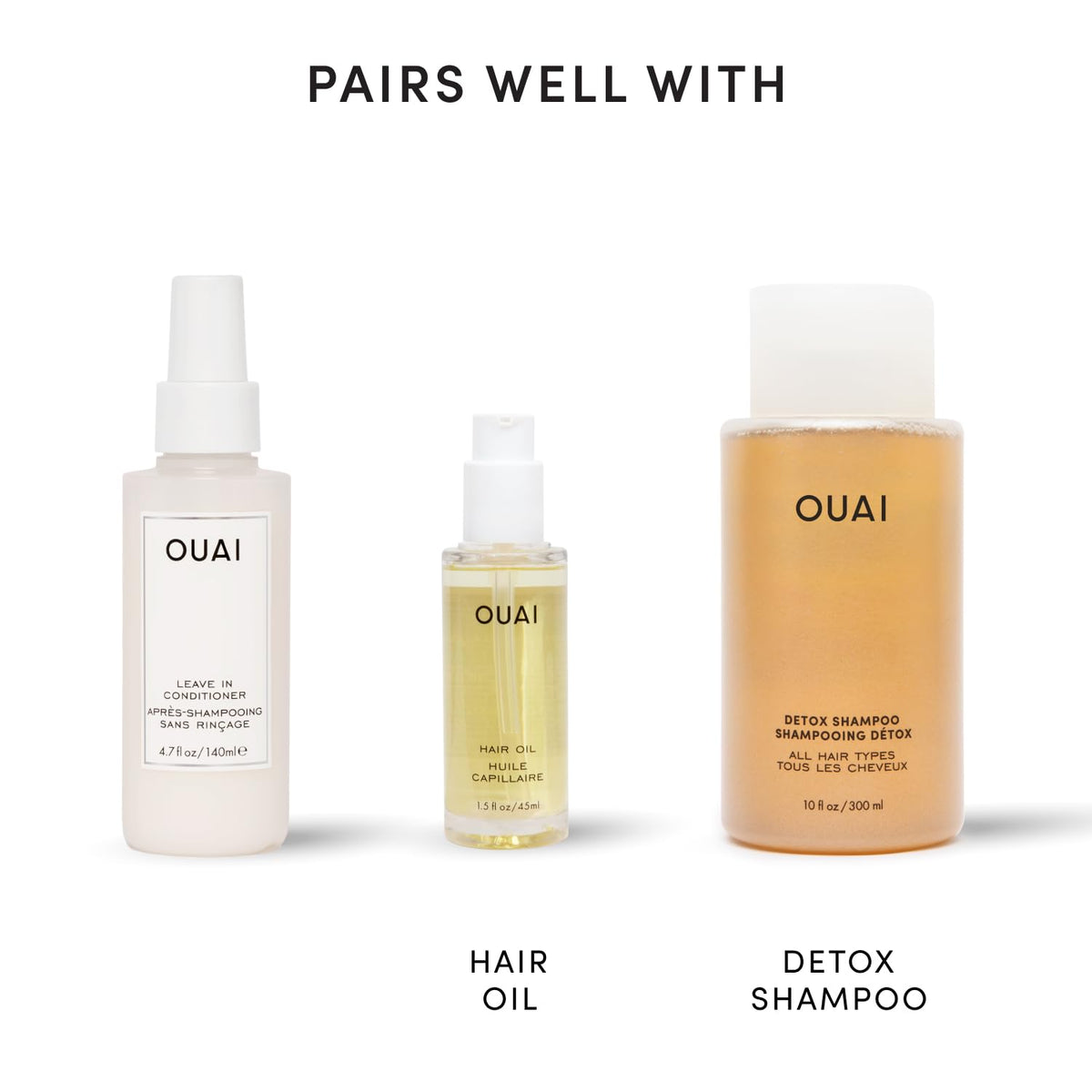 OUAI bottle on vanity with styling tools showing daily routine use